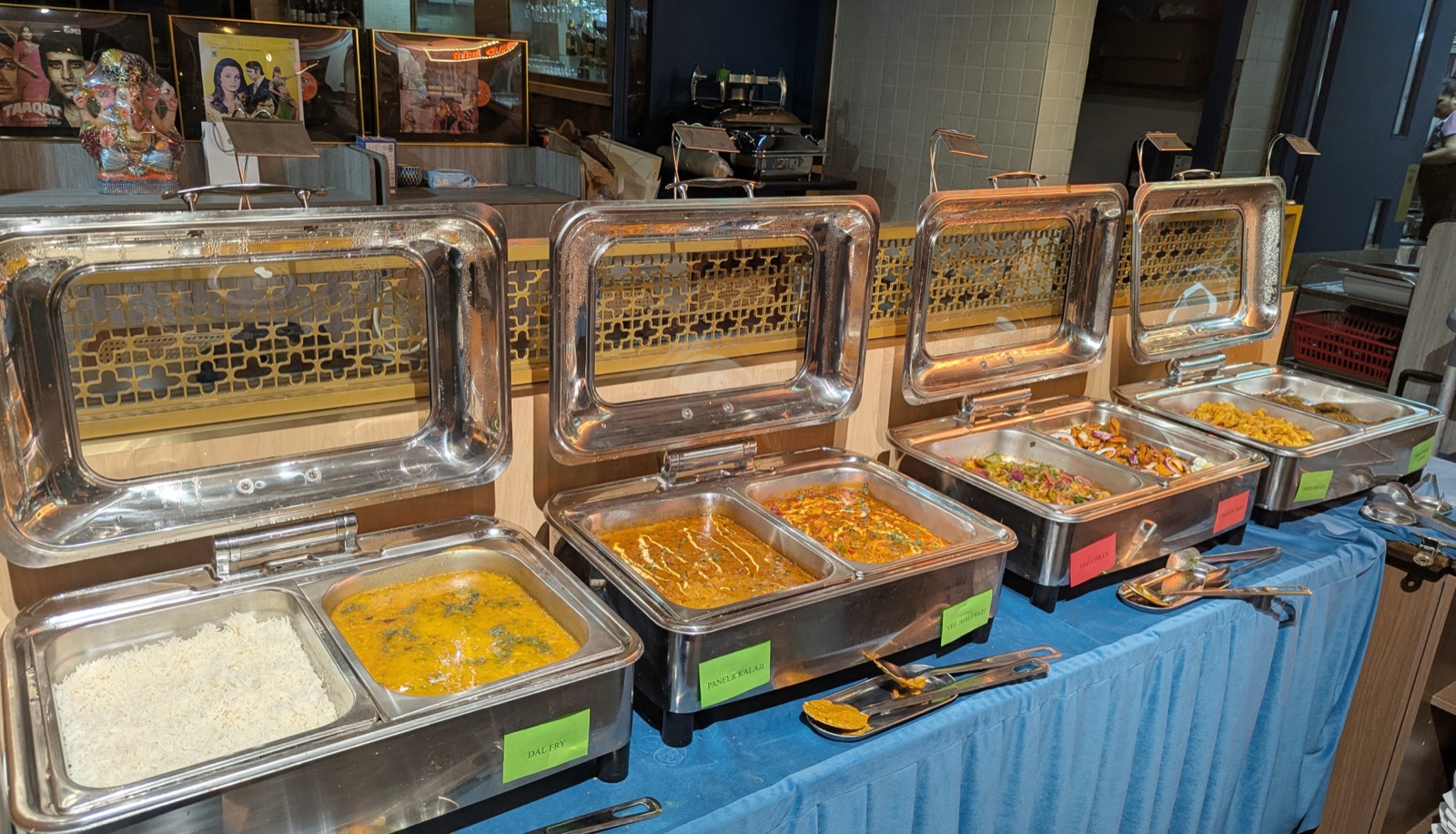 Weekday buffet chafing dishes of dal fry, paneer curry, mixed vegetables and steamed rice at Woodlands Wan Chai